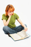 Young girl read the book on white Stock Image