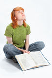 Young girl read the book on white Royalty Free Stock Images