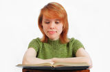 Young girl read the book on white Royalty Free Stock Photography