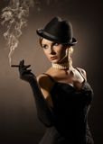 Lady and cigar Royalty Free Stock Image