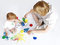 Stock Image : Young mother with beauty baby paint on white background
