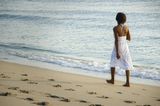 Woman on the beach. Stock Photography