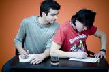 Guy cheating on exam Royalty Free Stock Images