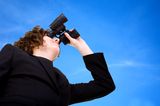 Business vision - businesswoman over a blue sky Royalty Free Stock Photo