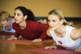Adult females in yoga class. Royalty Free Stock Photo