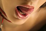Woman licking lips. Royalty Free Stock Photo