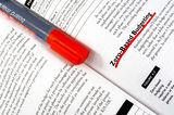 A marker on the textbook Royalty Free Stock Image