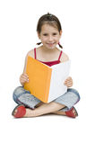 Young girl reading a book Stock Photo