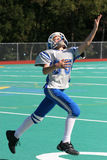 Teen Youth Football Player to Catch the Ball Royalty Free Stock Image
