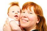 Redheaded mother and baby Stock Images