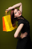 Redheaded Woman With Shopping Bags Royalty Free Stock Photos