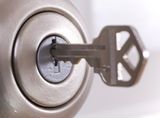 Lock and key Stock Images