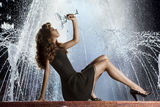Girl on Fountain Royalty Free Stock Photography