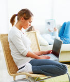 Education - Modern females catching up on studies Royalty Free Stock Images