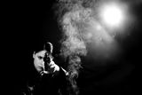Woman detective with a gun Stock Images