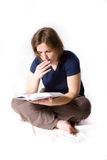 Young girl reading book Stock Images