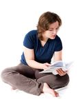 Young girl reading book Royalty Free Stock Photography