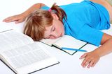Sleeping student girl Stock Photos
