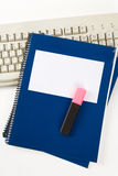 Blue school textbook and computer keyboard Stock Photography