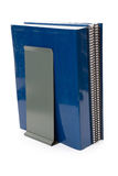 Blue school textbook and bookend Stock Image