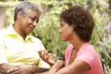 Senior Woman And Adult Daughter Chatting Stock Photos