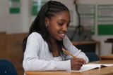 Student working Stock Images