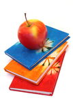 Books and apple Stock Images