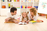 Little girl practice reading Stock Photo