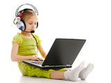Girlie in headphones with laptop Royalty Free Stock Photo