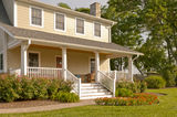 Suburban house with white porch Stock Photography