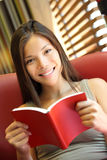 Woman reading book Stock Photography