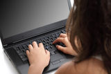 Laptop over the shoulder Royalty Free Stock Images