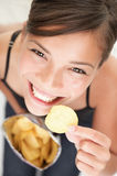 Chips woman Royalty Free Stock Photos