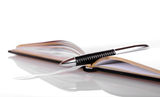 Pen and book Stock Photography