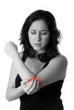 Woman with elbow pain Royalty Free Stock Photos