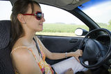 Young woman driving car  Royalty Free Stock Image