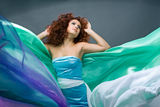 Beauty redheaded girl in fashion dress Royalty Free Stock Photo