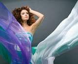 Beauty redheaded girl in fashion dress Royalty Free Stock Photography