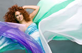 Beauty redheaded girl in fashion dress Stock Photo