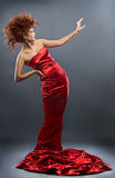 Beauty redheaded girl in fashion dress Royalty Free Stock Photo