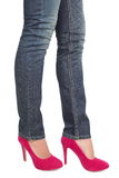Pink high heels and jeans - woman legs Royalty Free Stock Photography
