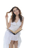 Young girl reading book Stock Photography