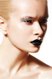 High fashion model. Silver make-up, black lips Royalty Free Stock Photography