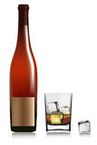 Bottle and lass with whiskey and ice cubes. Royalty Free Stock Image