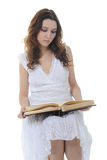 Young girl reading book Stock Photos