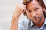 Closeup of a smart confident mid adult man Royalty Free Stock Photo
