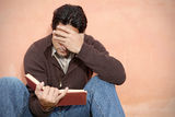 Man reading book or bible Royalty Free Stock Photos