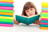 Young girl sitting with book Royalty Free Stock Photography