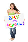 University student holding back to school sign Stock Photography