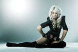 Young blonde in attractive high fashion clothes Royalty Free Stock Photo